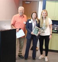 Laurie Goodrich (center) received 2023 Lifetime Achievement award presented by G Niemi (left) and J Long (right) 4