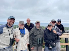 Frank Nicoletti (center) with Kim Eckert and friends at hawkwatch Fall 2023