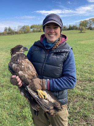 Abbie Valine with hatch year Bald Eagle by Frank Nicoletti